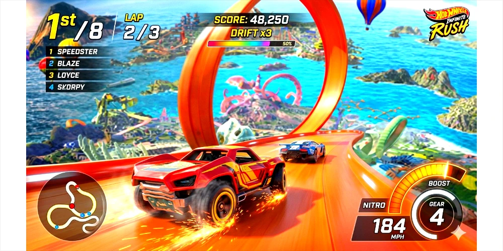 An in-game screenshot of the Hot Wheels Infinite Rush interface during an active race. A red muscle car speeds down a bright orange track, closely followed by a blue race car as they approach a giant loop-the-loop over a tropical ocean landscape. The head-up display (HUD) shows user interface elements including a "1st / 8" position tracker, a mini-map in the bottom-left corner, a leaderboard, a score counter with a "DRIFT x3" combo bar, and a glowing speedometer dashboard on the bottom-right showing 184 MPH at gear 4 with a nitro boost meter.